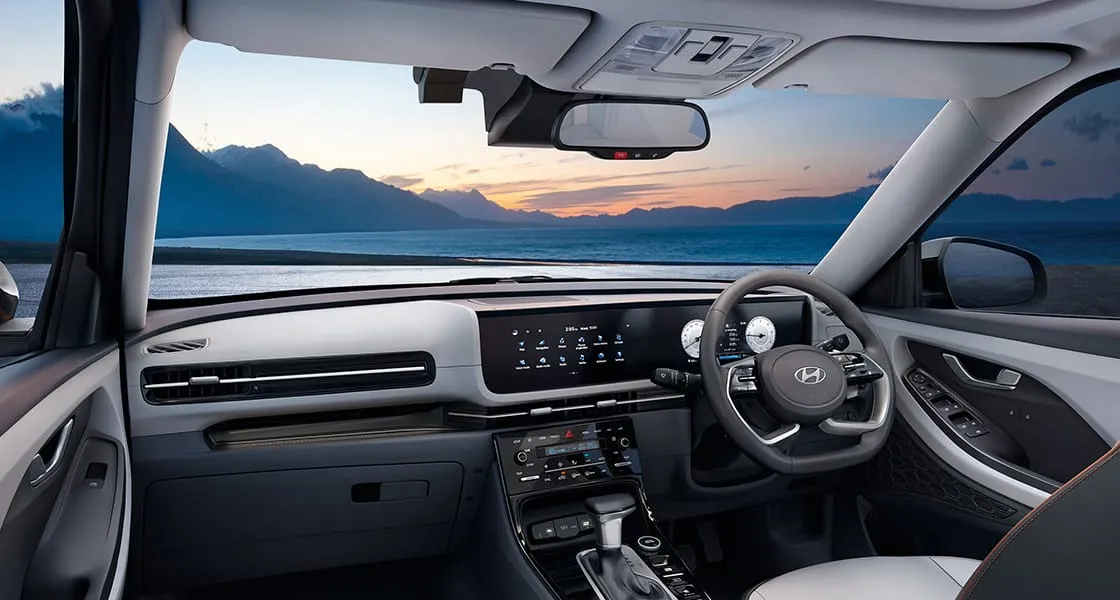 Hyundai Creta dashboard in grey two-tone with two 10.25-inch screens, seen from the rear seat